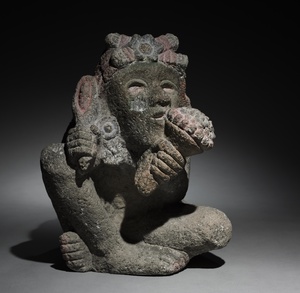 Seated Male Carrying Maize