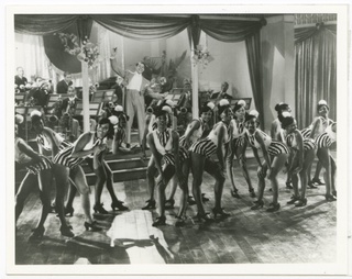Print of Cab Calloway with his band and dancers onstage at the Cotton Club