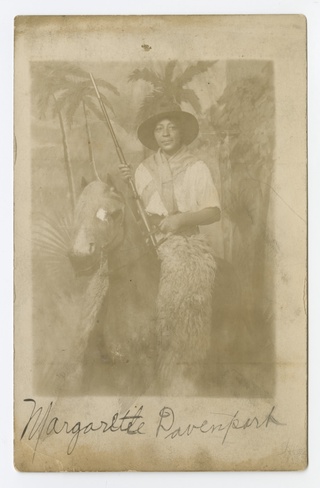 Photographic postcard portrait of Margarette Davenport in costume