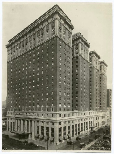 A photograph of the exterior of the Pennsylvania Hotel, outside of Penn Station in New York City. 