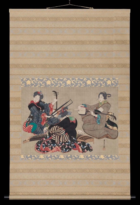 This hanging scroll features a rectangular drawn image of three musicians facing each other dressed in sumptuous garments. The layered stripes of the silk patterning and intricately drawn image form an elegant composition. 