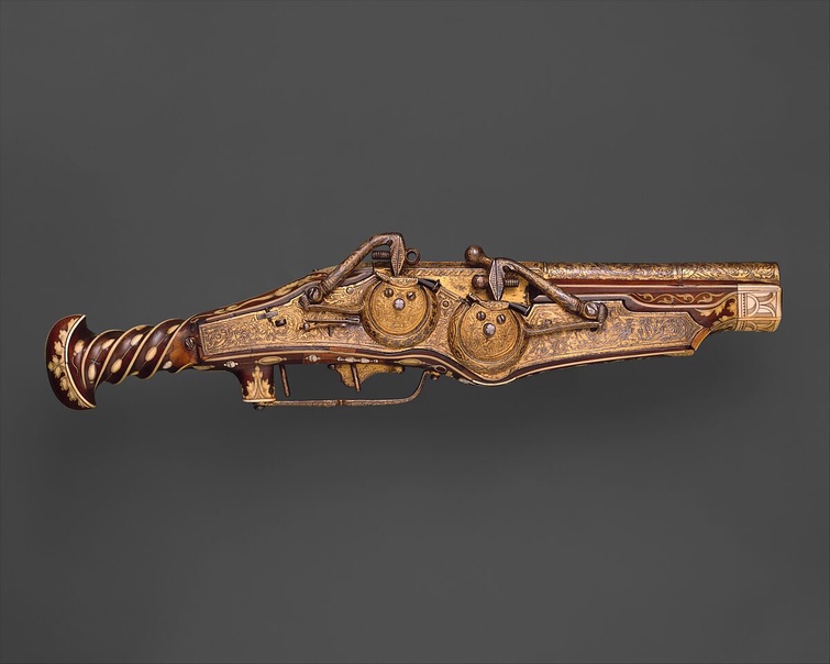 An ornamental pistol that has tarnished with age. A scene with men on horses on the verso.