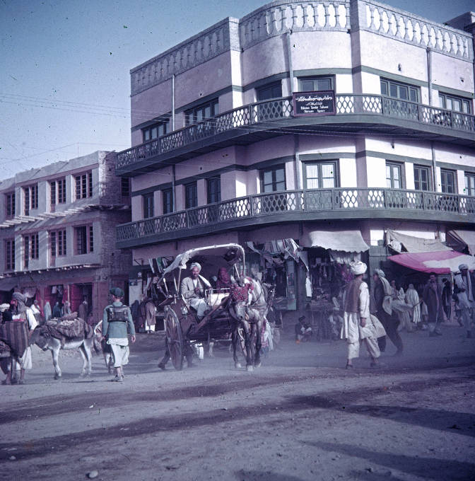 Harrison Forman, *Afghanistan, horse-drawn cart driving through Kabul street*, 1953. From Afghanistan: Images from the Harrison Forman Collection, American Geographical Society Library Digital Photo Archive, University of Wisconsin-Milwaukee Libraries.